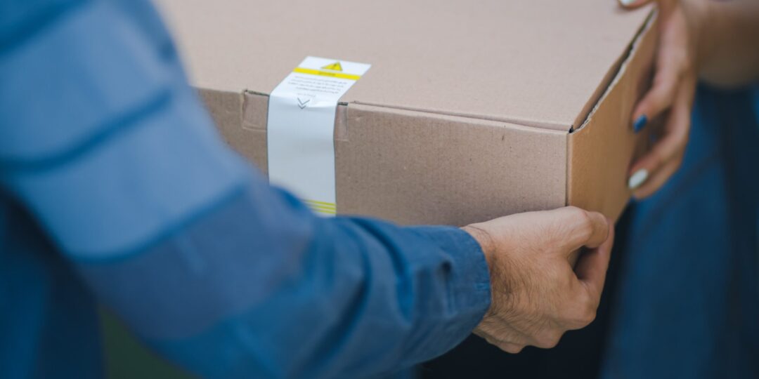 parcel-handover-scaled-1-1080x540.jpg